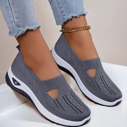 Women’s mesh flats in dark gray, breathable slip-on with cutout toe and white sole