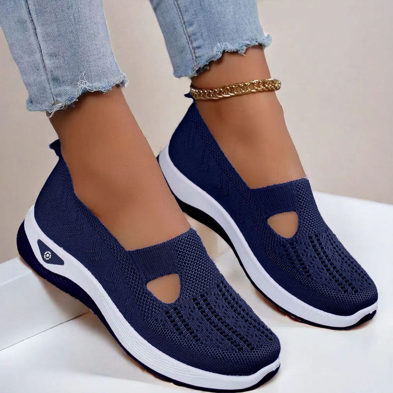 Women’s mesh flats in navy blue, breathable slip-on with cutout toe and white sole