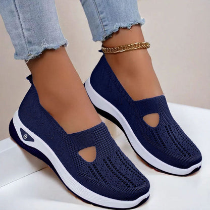 Women’s mesh flats in navy blue, breathable slip-on with cutout toe and white sole