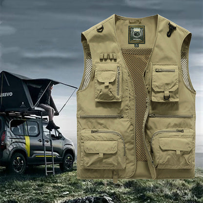 Men's Beige tactical vest with multiple pockets on a grassy background with a vehicle and rooftop tent. YAXSO