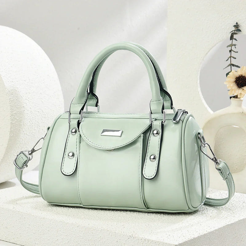 Green PU shoulder handbag with top handles and crossbody strap