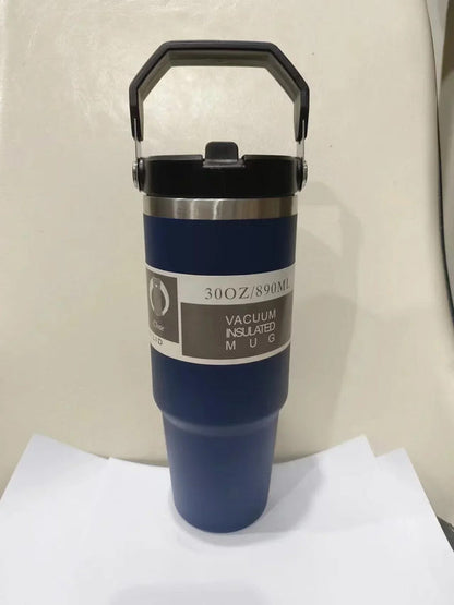 Navy blue vacuum insulated stainless steel travel tumbler with black lid, 30oz/890ml