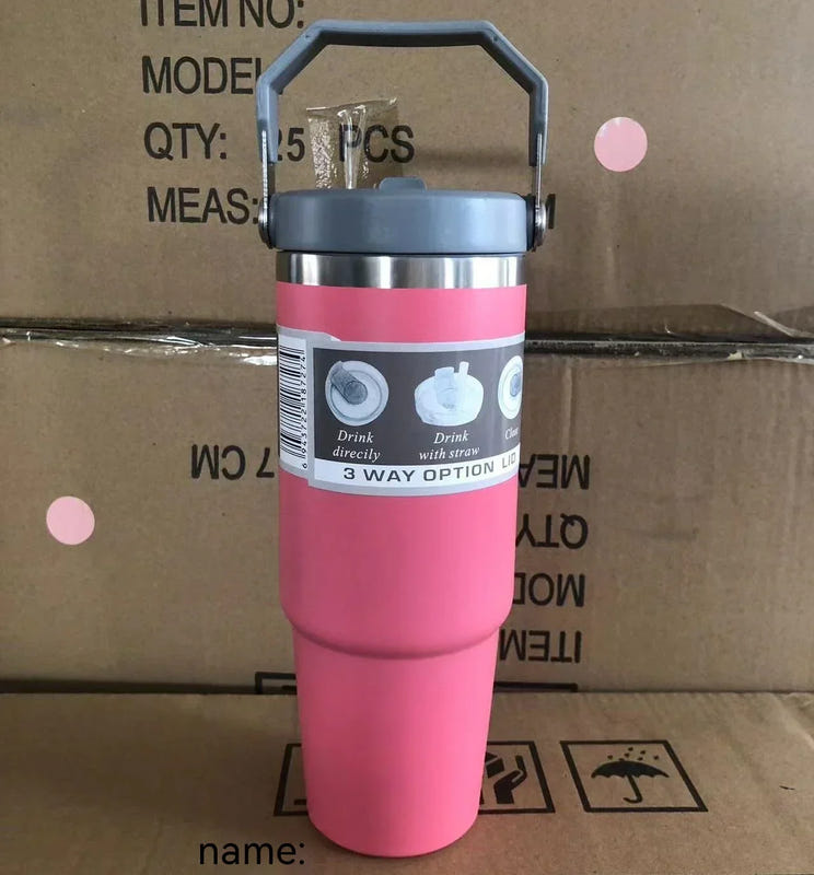 Pink vacuum insulated stainless steel travel tumbler with octagonal handle and black lid