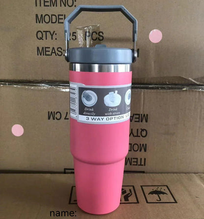 Pink vacuum insulated stainless steel travel tumbler with octagonal handle and black lid