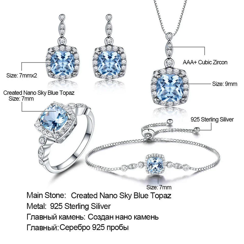 Sterling silver sky blue topaz jewelry set showing earrings, ring, bracelet and necklace