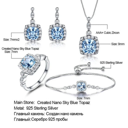 Sterling silver sky blue topaz jewelry set showing earrings, ring, bracelet and necklace
