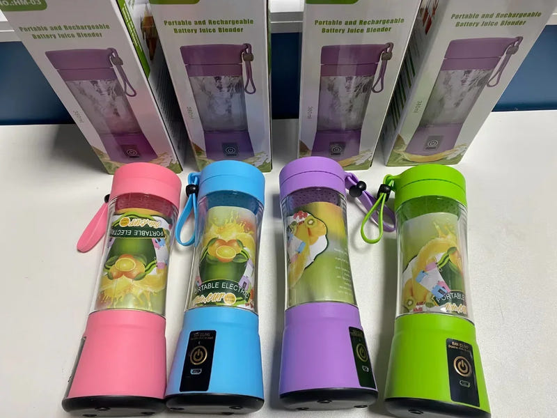 Portable USB rechargeable blender in pink, blue, purple, and green with wrist straps