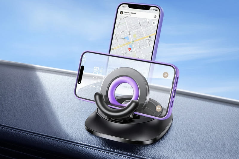 Black magnetic car phone holder with purple ring, foldable base on dashboard