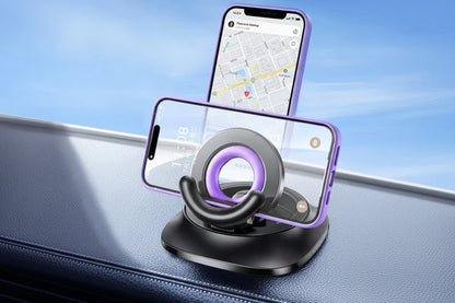 Black magnetic car phone holder with purple ring, foldable base on dashboard