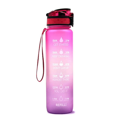 1L pink-to-purple gradient motivational water bottle with flip lid and wrist strap