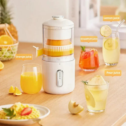 White portable electric juicer with two glasses of citrus juice