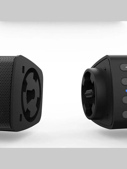 Black Bluetooth speaker driver detail with end cap and side button controls