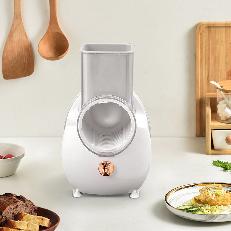 White kitchen appliance on a countertop with wooden utensils.  YAXSO STORE UAE