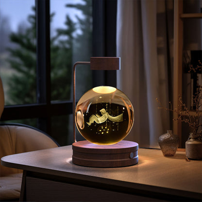 Decorative lamp with a glowing interior on a table in a room with a window and plants.