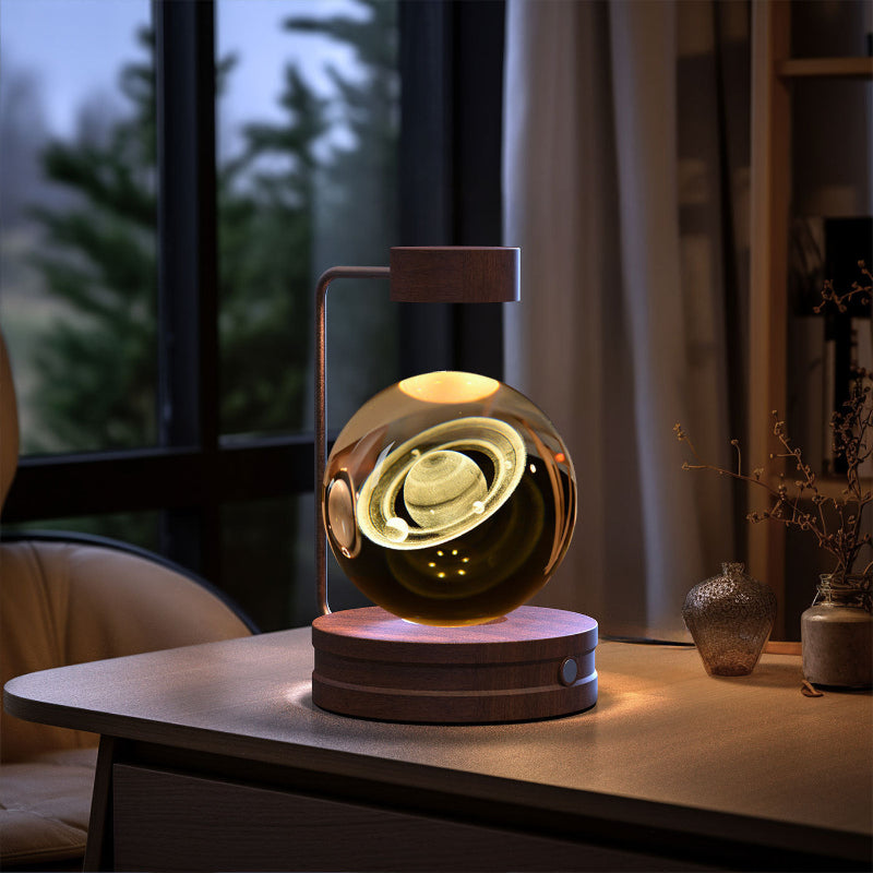 Decorative lamp with a glowing sphere on a wooden table in a room with a window and plants.