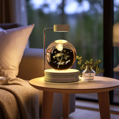 Decorative lamp with floral design on a small table in a cozy room.