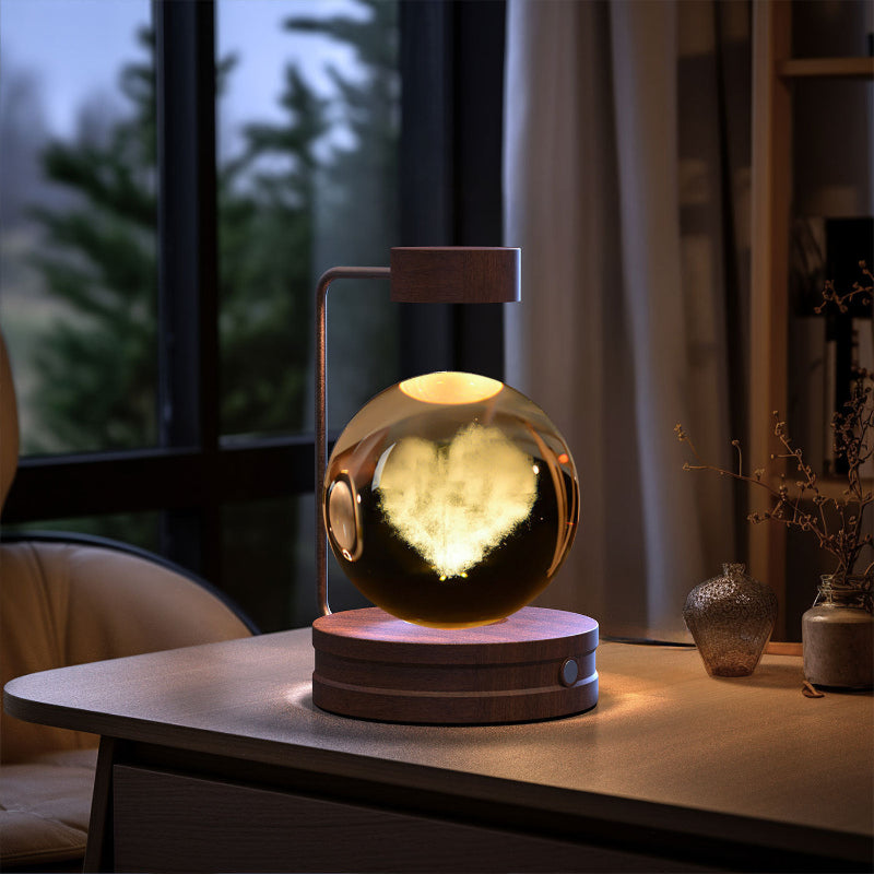 Glowing spherical lamp on a wooden table with a blurred indoor background