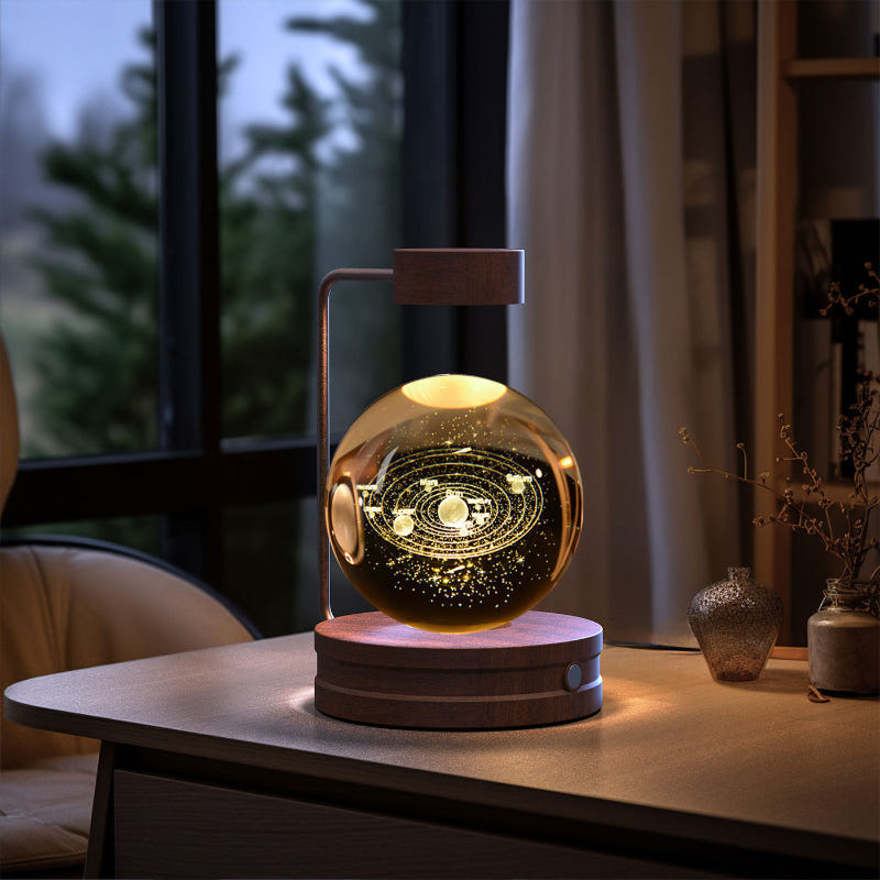 Cosmic LED night light with glowing ringed galaxy pattern in crystal dome
