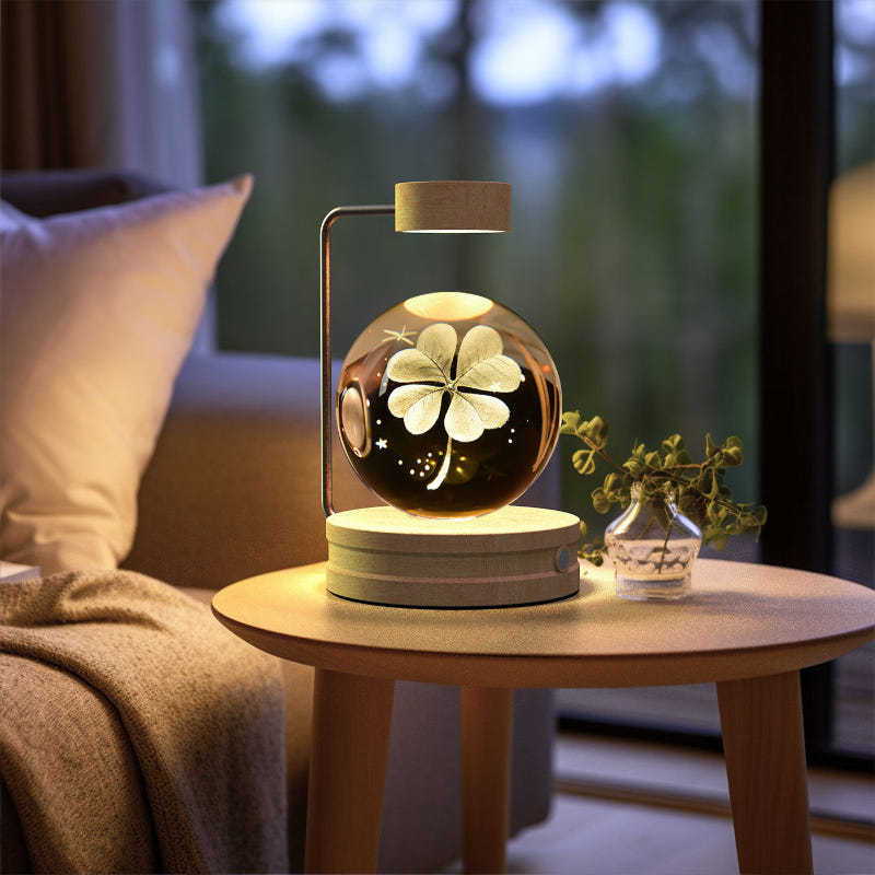 Cosmic LED night light with glowing four-leaf clover design in crystal dome