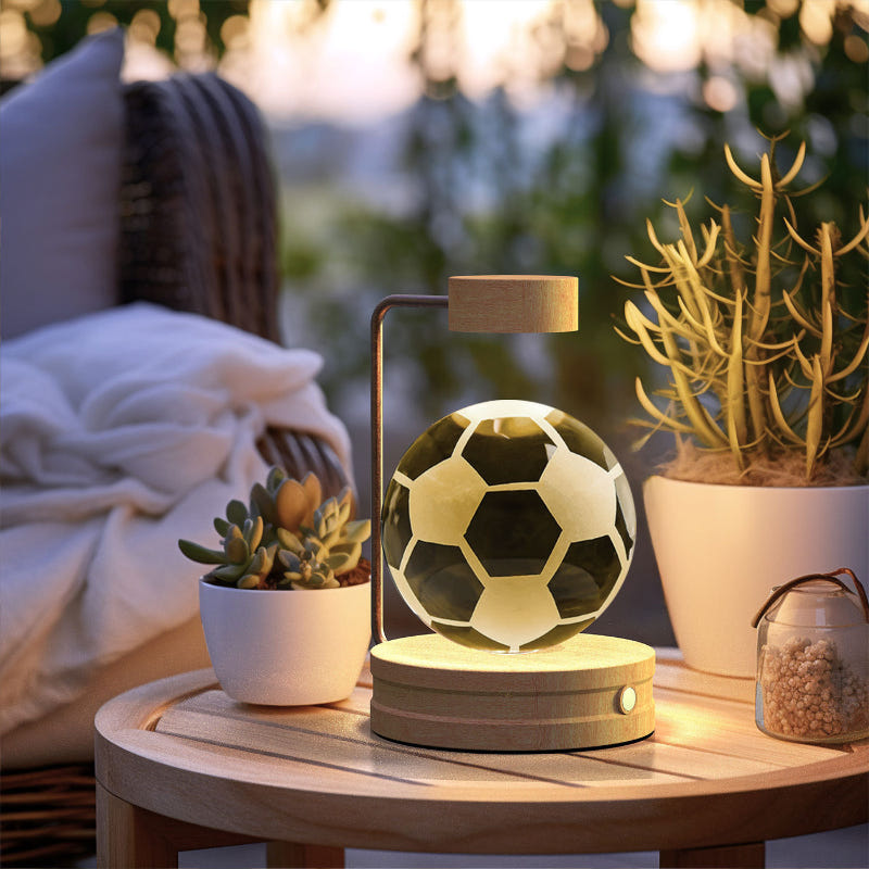 Cosmic LED night light with glowing soccer ball scene in clear crystal dome