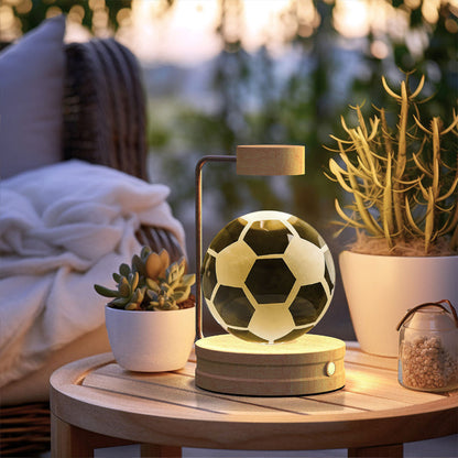 Cosmic LED night light with glowing soccer ball scene in clear crystal dome