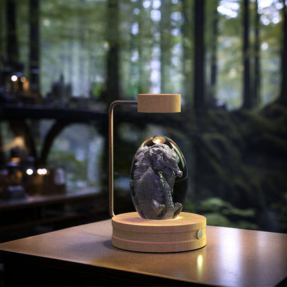 Cosmic LED crystal ball night light with glowing dragon or dinosaur figure inside globe