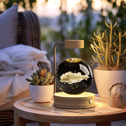 Cosmic LED crystal ball night light with glowing animal silhouette inside glass globe