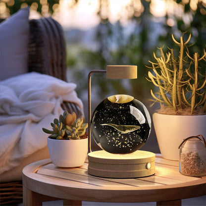 Cosmic LED crystal ball night light with starry glass globe and wooden base