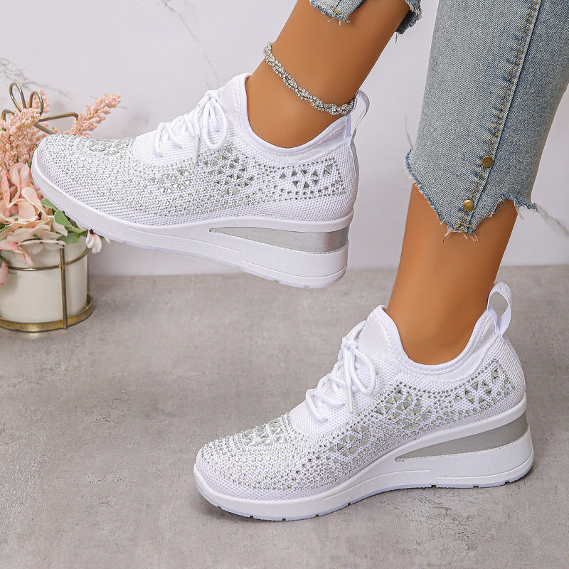 White breathable wedge sneakers with mesh knit, lace-up, thick platform sole.