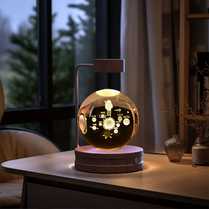 Decorative lamp with glowing design on a wooden table