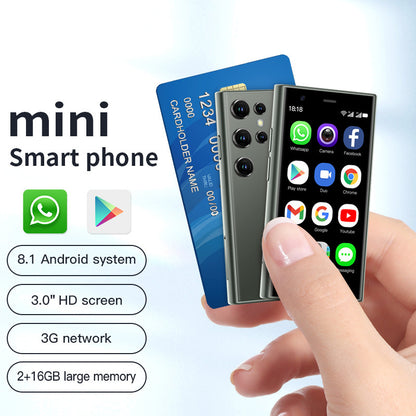 Hand holding a small smartphone next to a credit card with app icons and specifications YAXSO UAE ONLINE STORE