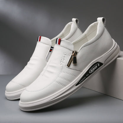 White sneakers with a gold zipper on a gray background
