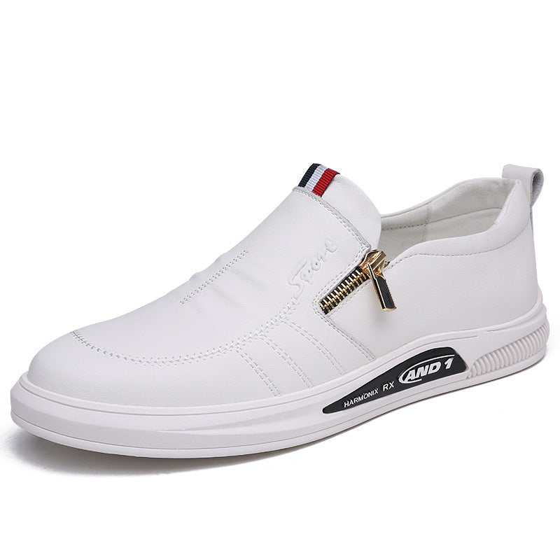 White slip-on shoe with a gold zipper on a white background