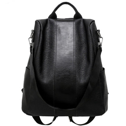 Black leather backpack on a white background