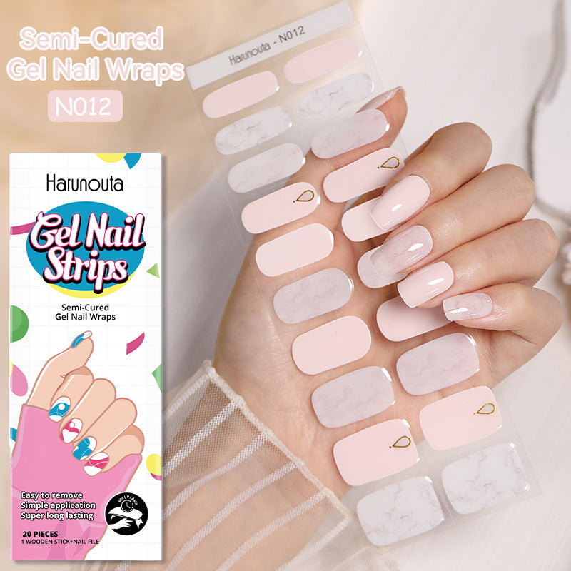 Semi-cured gel nail wraps with nude-pink nails and small minimalist line art details (N012).