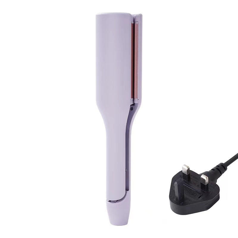 Hair straightener with plug on a white background