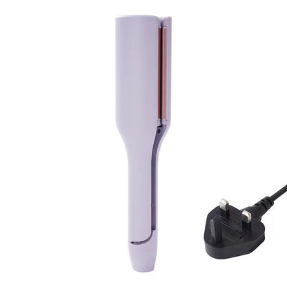 Hair straightener with plug on a white background