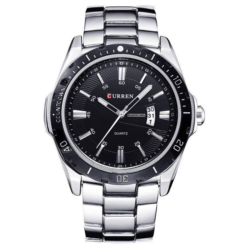 Curren watch with black dial and silver metal strap on a white background