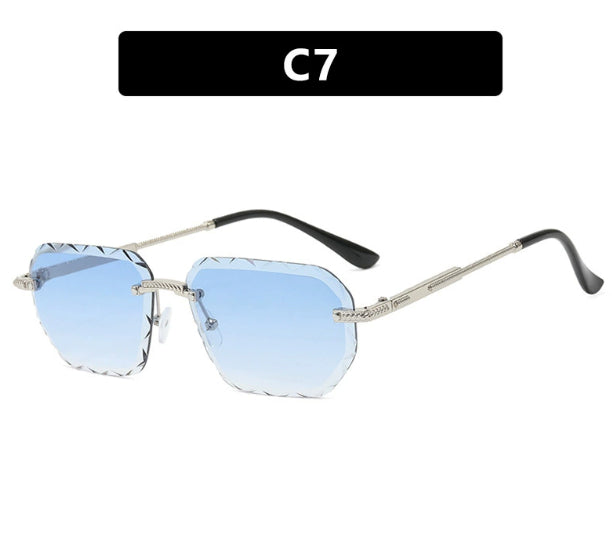 Sunglasses with blue lenses and silver frames on a white background