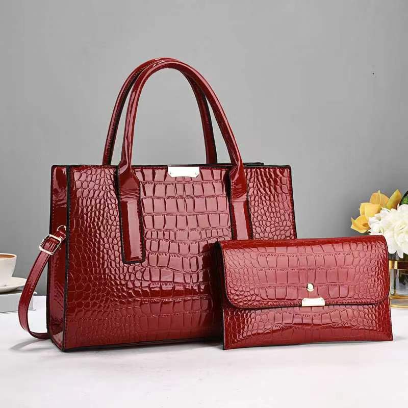 Mother and child bag set in red, croc-texture tote with matching clutch