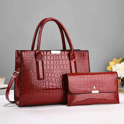 Mother and child bag set in red, croc-texture tote with matching clutch