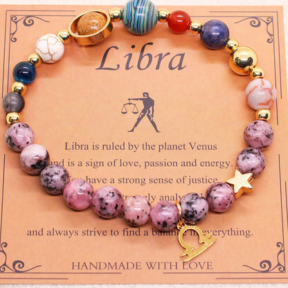 Libra zodiac stone bracelet with pink and purple beads, gold tone accents, star charm