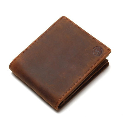Brown leather wallet on a white background