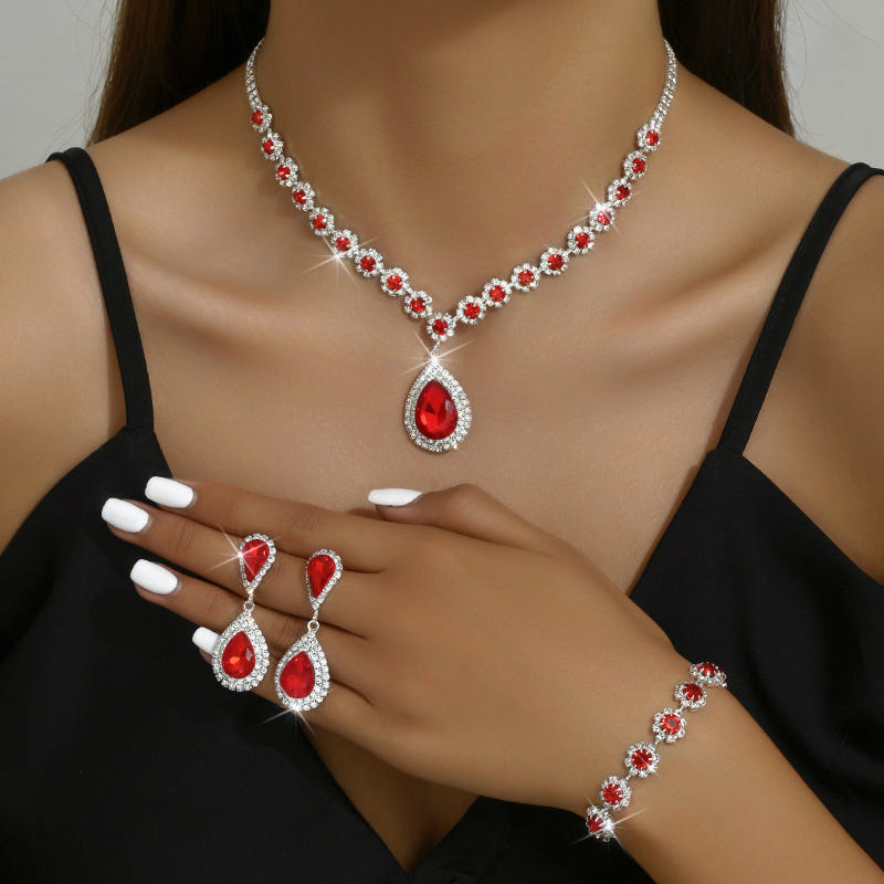 Rhinestone bridal jewelry set: red teardrop necklace, matching earrings and bracelet