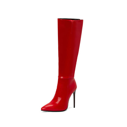 Red knee-high boot with a high heel on a white background