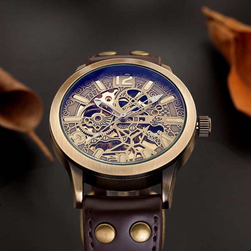 Luxury watch with intricate design and brown leather strap on a dark background