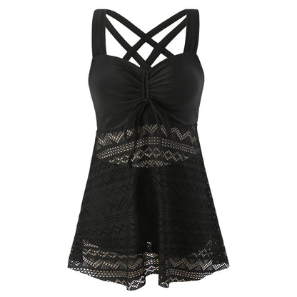 Black lace tank top with criss-cross straps on a white background
