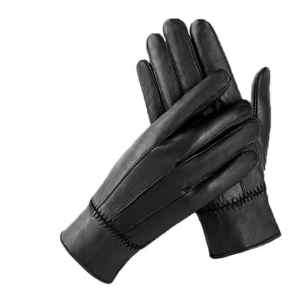 Pair of black leather gloves on a white background