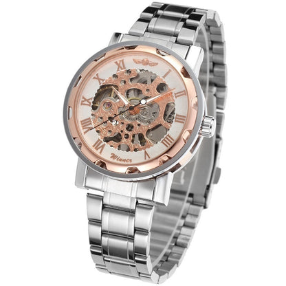 Silver and rose gold watch with visible mechanical components on a white background