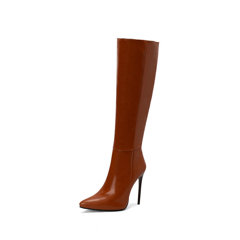 Brown knee-high boot on a white background